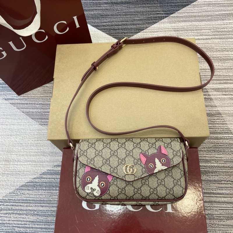 G*u*i satchel bags